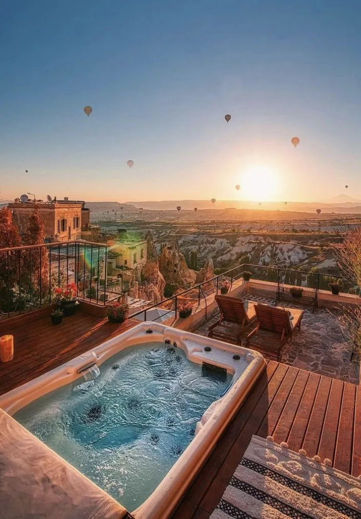 Taskonaklar terrace and hot tub overlooking balloons in Uchisar